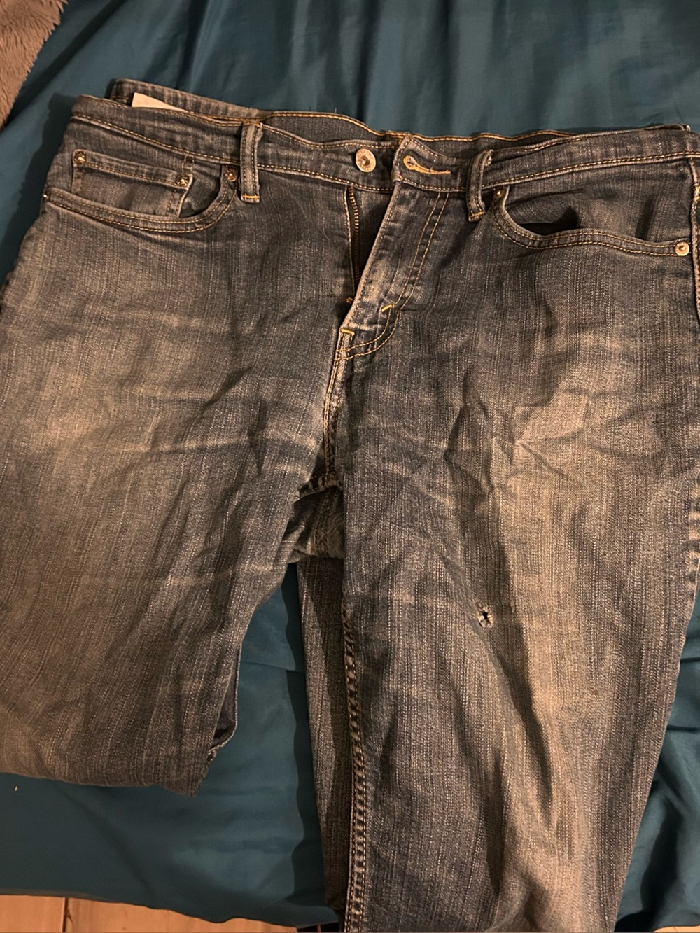 Levi's faded blue straight-leg jeans